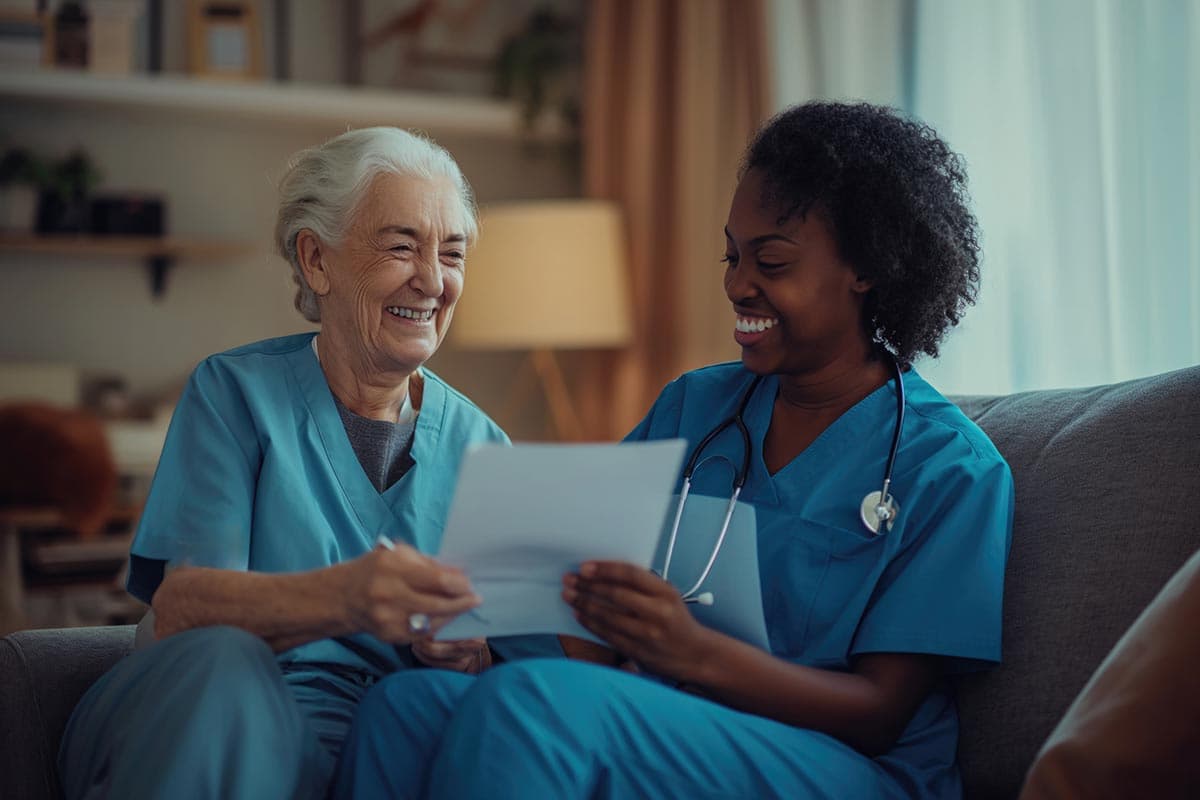 A care professional sharing information with an older participant